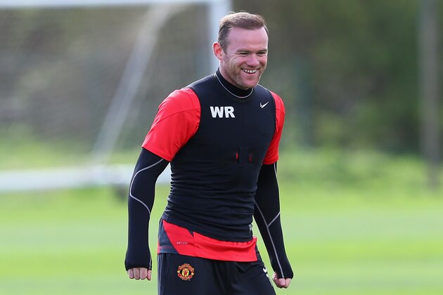 MANCHESTER, ENGLAND - APRIL 08:  Wayne Rooney of Manchester United looks on during a training session at Aon Training Complex on April 8, 2014 in Manchester, England.  (Photo by Alex Livesey/Getty Images)