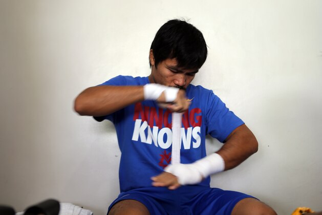 GENERAL SANTOS, PHILIPPINES - MARCH 04:  Manny Pacquiao is seen during a training session on March 4, 2014 in General Santos, Philippines. Pacquiao will fight for WBO welterweight championship rematch against Timothy Bradley on April 12, 2014 at the MGM Grand in Las Vegas, Nevada. (Photo by Jeoffrey Maitem/Getty Images)