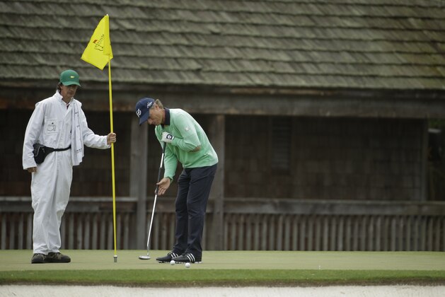 Bernhard Langer, of Germany, putts on the 11th green during a practice round for the Masters golf tournament Tuesday, April 8, 2014, in Augusta, Ga. (AP Photo/Chris Carlson)
