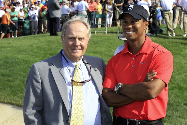 Jack Nicklaus, left, and Tiger Woods talk after Woods won the Memorial golf tournament at the Muirfield Village Golf Club in Dublin, Ohio, Sunday, June 3, 2012. (AP Photo/Tony Dejak)
