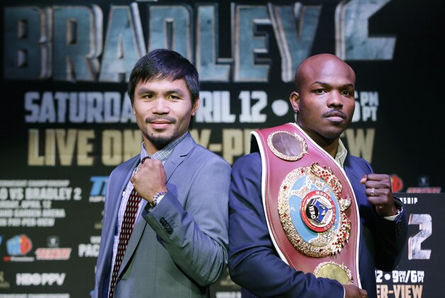 Boxer Manny Pacquiao, of the Phillipines, left, poses for a photo with current WBO World Welterweight champion Timothy Bradley of Indio, Calif., during a press conference Thursday, Feb. 6, 2014, in New York. The pair will face off in a title fight in Las Vegas, April 12, 2014. (AP Photo/Kathy Willens) Boxer Manny Pacquiao, of the Phillipines, left, poses for a photo with current WBO World Welterweight champion Timothy Bradley of Indio, Calif., during a press conference Thursday, Feb. 6, 2014, in New York. The pair will face off in a title fight in Las Vegas, April 12, 2014. (AP Photo/Kathy Willens)