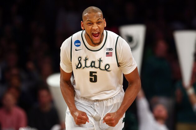 NEW YORK, NY - MARCH 30:  Adreian Payne #5 of the Michigan State Spartans reacts after a basket in the second half against the Connecticut Huskies during the East Regional Final of the 2014 NCAA Men's Basketball Tournament at Madison Square Garden on March 30, 2014 in New York City.  (Photo by Elsa/Getty Images)