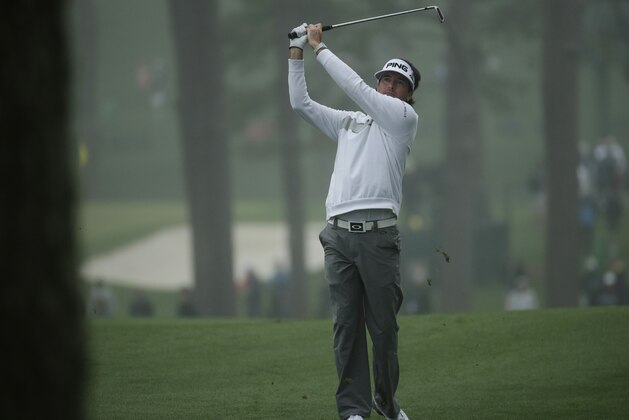 Bubba Watson watches his shot on the 17th fairway during a practice session for the Masters golf tournament Monday, April 7, 2014, in Augusta, Ga. (AP Photo/Charlie Riedel)