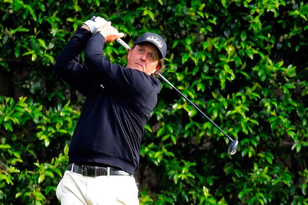 AUGUSTA, GA - APRIL 08:  Phil Mickelson of the United States hits a shot during a practice round prior to the start of the 2014 Masters Tournament at Augusta National Golf Club on April 8, 2014 in Augusta, Georgia.  (Photo by Rob Carr/Getty Images)