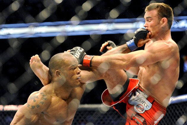Hector Lombard lands a punch on Jake Shields during a UFC 171 mixed martial arts welterweight bout, Saturday, March. 15, 2014, in Dallas. Lombard won by decision. (AP Photo/Matt Strasen) Hector Lombard lands a punch on Jake Shields during a UFC 171 mixed martial arts welterweight bout, Saturday, March. 15, 2014, in Dallas. Lombard won by decision. (AP Photo/Matt Strasen)