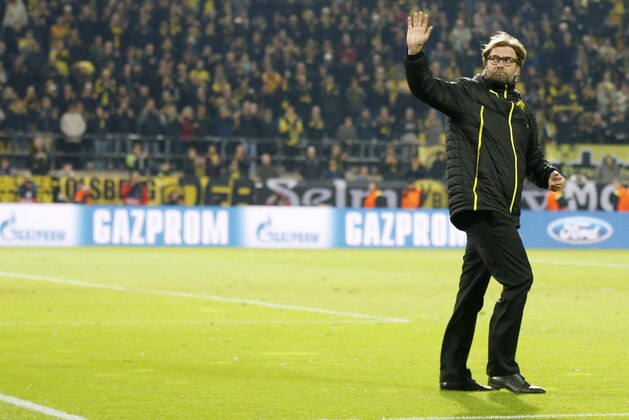 Dortmund head coach Juergen Klopp reacts after the Champions League quarterfinal second leg soccer match between Borussia Dortmund and Real Madrid in the Signal Iduna stadium in Dortmund, Germany, Tuesday, April 8, 2014. (AP Photo/Frank Augstein) Dortmund head coach Juergen Klopp reacts after the Champions League quarterfinal second leg soccer match between Borussia Dortmund and Real Madrid in the Signal Iduna stadium in Dortmund, Germany, Tuesday, April 8, 2014. (AP Photo/Frank Augstein)