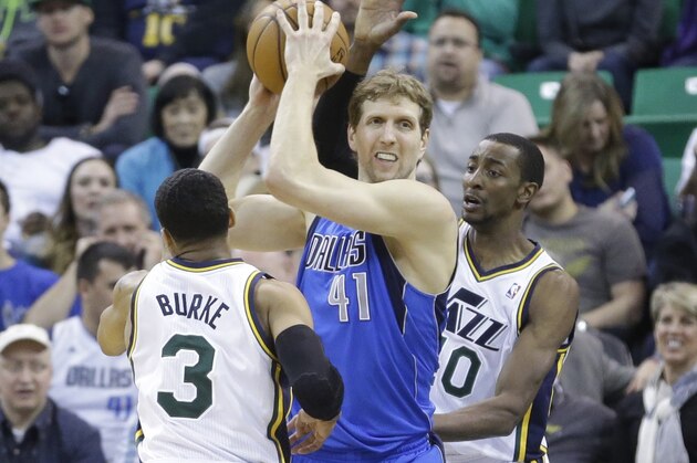 Dallas Mavericks' Dirk Nowitzki (41) passes the ball as Utah Jazz's Trey Burke (3) and Utah Jazz's forward Jeremy Evans (40) defend in the second half during an NBA basketball game Wednesday, March 12, 2014, in Salt Lake City. (AP Photo/Rick Bowmer) Dallas Mavericks' Dirk Nowitzki (41) passes the ball as Utah Jazz's Trey Burke (3) and Utah Jazz's forward Jeremy Evans (40) defend in the second half during an NBA basketball game Wednesday, March 12, 2014, in Salt Lake City. (AP Photo/Rick Bowmer)