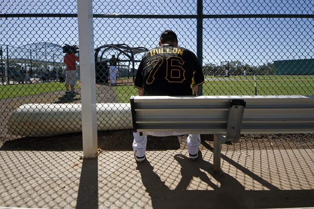 Pittsburgh Pirates pitcher Jameson Taillon waits his turn to throw against hitters during the team's baseball spring training workout in Bradenton, Fla., Thursday, Feb. 20, 2014. (AP Photo/Gene J. Puskar)