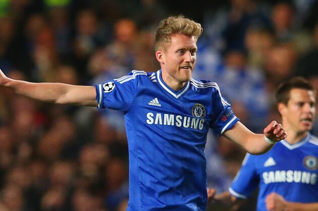 LONDON, ENGLAND - APRIL 08:  John Terry of Chelsea congratulates Andre Schurrle of Chelsea on scoring their first goal during the UEFA Champions League Quarter Final second leg match between Chelsea and Paris Saint-Germain FC at Stamford Bridge on April 8, 2014 in London, England.  (Photo by Julian Finney/Getty Images)
