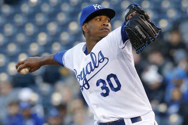 Kansas City Royals starting pitcher Yordano Ventura delivers to a Tampa Bay Rays batter during the first inning of a baseball game at Kauffman Stadium in Kansas City, Mo., Tuesday, April 8, 2014. (AP Photo/Orlin Wagner)