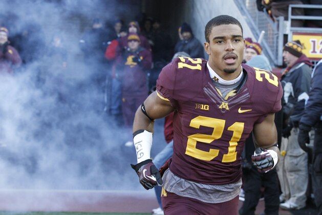 Minnesota defensive back Brock Vereen (21) takes the field prior to an NCAA college football game against Wisconsin in Minneapolis Saturday, Nov. 23, 2013. (AP Photo/Ann Heisenfelt)