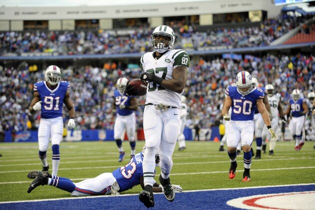 New York Jets tight end Jeff Cumberland (87) scores a touchdown against the Buffalo Bills  during the second half of an NFL football game on Sunday, Nov. 17, 2013, in Orchard Park, N.Y. (AP Photo/Gary Wiepert)