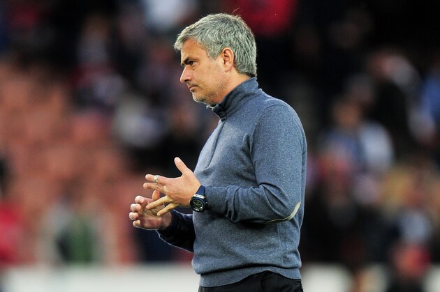 PARIS, FRANCE - APRIL 02:  Jose Mourinho the Chelsea manager watches over the pre-match warm up prior to kickoff during the UEFA Champions League quarter final, first leg match between Paris Saint Germain and Chelsea at Parc des Princes on April 2, 2014 in Paris, France.  (Photo by Shaun Botterill/Getty Images)