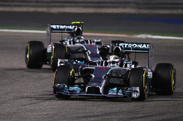 SAKHIR, BAHRAIN - APRIL 06:  Lewis Hamilton of Great Britain and Mercedes GP leads from team mate Nico Rosberg of Germany and Mercedes GP at the start of the Bahrain Formula One Grand Prix at the Bahrain International Circuit on April 6, 2014 in Sakhir, Bahrain.  (Photo by Mark Thompson/Getty Images)