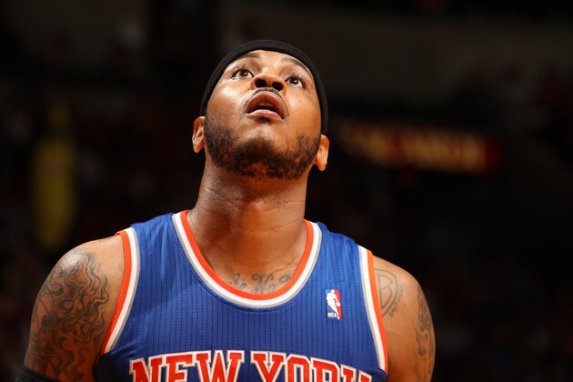 MIAMI, FL - April 6: Carmelo Anthony #7 of the New York Knicks looks on while on the court during the game at the American Airlines Arena in Miami, Florida on April 6, 2014. NOTE TO USER: User expressly acknowledges and agrees that, by downloading and/or using this photograph, user is consenting to the terms and conditions of the Getty Images License Agreement. Mandatory copyright notice: Copyright NBAE 2014 (Photo by Issac Baldizon/NBAE via Getty Images) MIAMI, FL - April 6: Carmelo Anthony #7 of the New York Knicks looks on while on the court during the game at the American Airlines Arena in Miami, Florida on April 6, 2014. NOTE TO USER: User expressly acknowledges and agrees that, by downloading and/or using this photograph, user is consenting to the terms and conditions of the Getty Images License Agreement. Mandatory copyright notice: Copyright NBAE 2014 (Photo by Issac Baldizon/NBAE via Getty Images)
