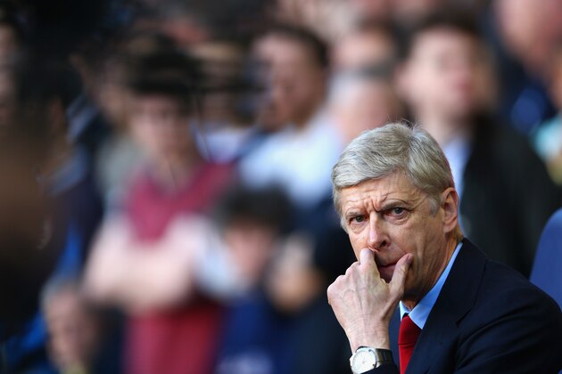 LONDON, ENGLAND - MARCH 16: Arsene Wenger manager of Arsenal looks on during the Barclays Premier League match between Tottenham Hotspur and Arsenal at White Hart Lane on March 16, 2014 in London, England. (Photo by Paul Gilham/Getty Images) LONDON, ENGLAND - MARCH 16: Arsene Wenger manager of Arsenal looks on during the Barclays Premier League match between Tottenham Hotspur and Arsenal at White Hart Lane on March 16, 2014 in London, England. (Photo by Paul Gilham/Getty Images)