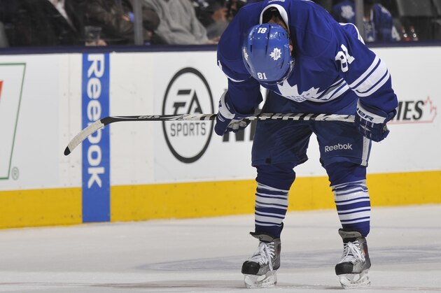 Toronto Maple Leafs right wing Phil Kessel (81), defenseman Jake Gardiner (51), and defenseman Morgan Rielly (44) react after Tampa Bay Lightning defenseman Victor Hedman (77), of Sweden, scored during the third period of an NHL hockey game Tuesday, April 8, 2014, in Tampa, Fla. The Lightning won the game 3-0. (AP Photo/Chris O'Meara)