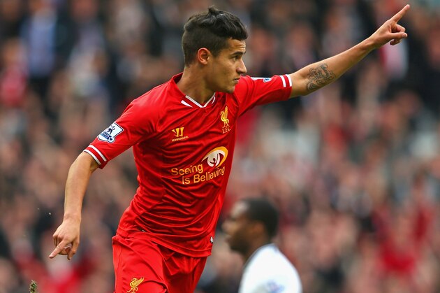LIVERPOOL, ENGLAND - MARCH 30:  Philippe Coutinho of Liverpool celebrates scoring the third goal during the Barclays Premier League match between Liverpool and Tottenham Hotspur at Anfield on March 30, 2014 in Liverpool, England.  (Photo by Alex Livesey/Getty Images)