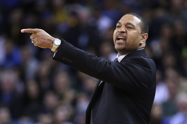 Golden State Warriors coach Mark Jackson directs his team against the Sacramento Kings during the first half of an NBA basketball game Friday, April 4, 2014, in Oakland, Calif. (AP Photo/Marcio Jose Sanchez)
