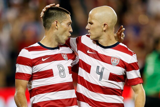 KANSAS CITY, KS - OCTOBER 16:  Michael Bradley #4 of the USA congratulates Clint Dempsey #8 after Dempsey scored a goal during the first half fo the World Cup Qualifying match against Guatemala at LiveStrong Sporting Park on October 16, 2012 in Kansas City, Kansas.  (Photo by Jamie Squire/Getty Images)
