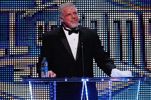 FILE - In this April 5, 2014 file photo provided by the WWE, James Hellwig, aka The Ultimate Warrior, speaks during the WWE Hall of Fame Induction at the Smoothie King Center in New Orleans. The WWE said Hellwig, one of pro wrestling's biggest stars in the late 1980s, died Tuesday, April 8, 2014. He was 54. (Jonathan Bachman/AP Images for WWE, File)