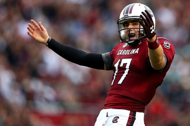 COLUMBIA, SC - NOVEMBER 23:  Dylan Thompson #17 of the South Carolina Gamecocks celebrates after a touchdown during their game against the Coastal Carolina Chanticleers at Williams-Brice Stadium on November 23, 2013 in Columbia, South Carolina.  (Photo by Streeter Lecka/Getty Images)