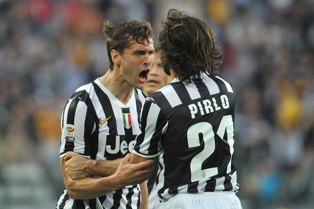 TURIN, ITALY - APRIL 07:  Fernando Lorente (L) of Juventus celebrates his second goal during the Serie A match between Juventus and AS Livorno Calcio at Juventus Arena on April 7, 2014 in Turin, Italy.  (Photo by Valerio Pennicino/Getty Images)