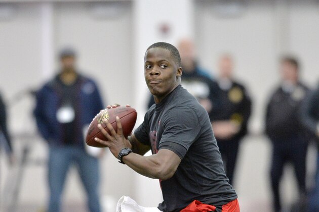 Louisville quarterback Teddy Bridgewater participates in a passing drill for NFL representatives during pro day at the University of Louisville in Louisville, Ky., Monday, March 17, 2014. (AP Photo/Timothy D. Easley)