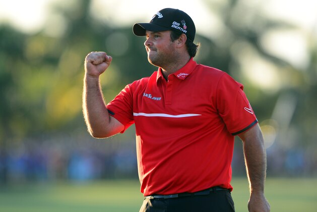 Mar 9, 2014; Miami, FL, USA; Patrick Reed celebrates on the 18th green after winning the WGC - Cadillac Championship golf tournament at TPC Blue Monster at Trump National Doral. Mandatory Credit: Andrew Weber-USA TODAY Sports