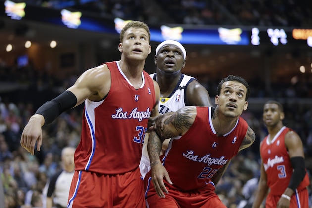 Los Angeles Clippers forward Blake Griffin (32) and Matt Barnes (22) block out Memphis Grizzlies forward Zach Randolph, center, in the second half of an NBA basketball game on Saturday, April 13, 2013, in Memphis, Tenn. The Clippers won 91-87. (AP Photo/Mark Humphrey)
