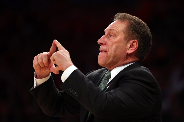 NEW YORK, NY - MARCH 28:  Head coach Tom Izzo of the Michigan State Spartans gestures from the bench against the Virginia Cavaliers during the regional semifinal of the 2014 NCAA Men's Basketball Tournament at Madison Square Garden on March 28, 2014 in New York City.  (Photo by Elsa/Getty Images)