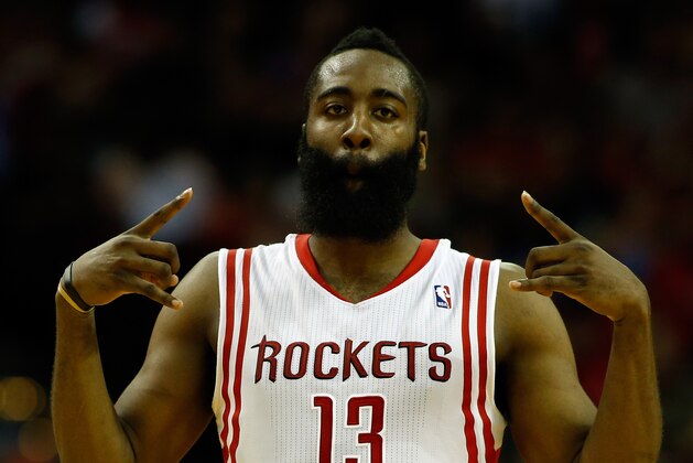 HOUSTON, TX - APRIL 04:  James Harden #13 of the Houston Rockets celebrates after hitting a 25 foot three pointer in the fourth period against the Oklahoma City Thunder during a game at the Toyota Center on April 4, 2014 in Houston, Texas. NOTE TO USER: User expressly acknowledges and agrees that, by downloading and or using this photograph, User is consenting to the terms and conditions of the Getty Images License Agreement.  (Photo by Scott Halleran/Getty Images)