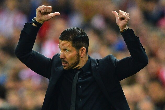 MADRID, SPAIN - APRIL 09:  Diego Simeone, Coach of Club Atletico de Madrid gestures during the UEFA Champions League Quarter Final second leg match between Club Atletico de Madrid and FC Barcelona at Vicente Calderon Stadium on April 9, 2014 in Madrid, Spain.  (Photo by Laurence Griffiths/Getty Images)