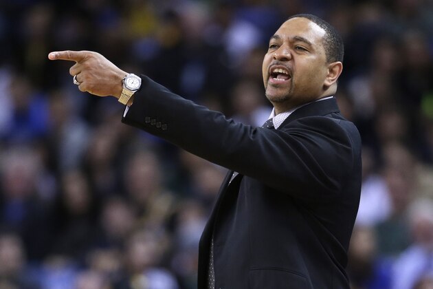 Golden State Warriors coach Mark Jackson directs his team against the Sacramento Kings during the first half of an NBA basketball game Friday, April 4, 2014, in Oakland, Calif. (AP Photo/Marcio Jose Sanchez)