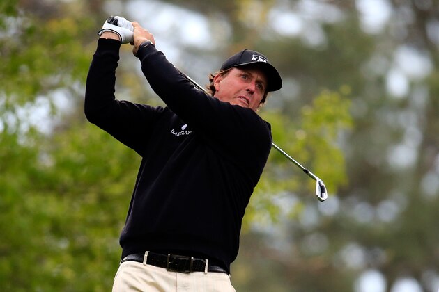 AUGUSTA, GA - APRIL 08:  Phil Mickelson of the United States hits a shot during a practice round prior to the start of the 2014 Masters Tournament at Augusta National Golf Club on April 8, 2014 in Augusta, Georgia.  (Photo by Rob Carr/Getty Images)