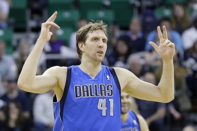 Dallas Mavericks' Dirk Nowitzki (41) celebrates his 3 pointer in the second half during an NBA basketball game against the Utah Jazz Tuesday, April 8, 2014, in Salt Lake City. (AP Photo/Rick Bowmer)