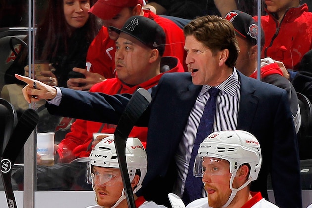 NEWARK, NJ - MARCH 04: Head coach Mike Babcock of the Detroit Red Wings gives instructions during a timeout againmst the New Jersey Devils during the game at the Prudential Center on March 4, 2014 in Newark, New Jersey. (Photo by Andy Marlin/NHLI via Getty Images)