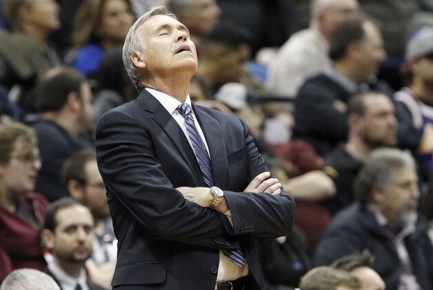 Los Angeles Lakers head coach Mike D'Antoni reacts to a call during the first quarter of an NBA basketball game against the Minnesota Timberwolves in Minneapolis, Friday, March 28, 2014.  (AP Photo/Ann Heisenfelt)