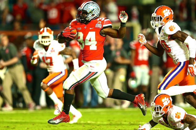 Denver Broncos running back Knowshon Moreno (27) is brought down by Seattle Seahawks defensive end Chris Clemons (91) and defensive end Cliff Avril (56) during the NFL Super Bowl XLVIII football game at MetLife Stadium Sunday, Feb. 2, 2014, in East Rutherford, N.J. The Seahawks won 43-8. (AP Photo/Paul Sancya)