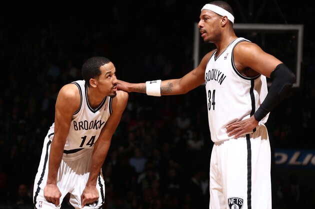 BROOKLYN, NY - MARCH 3: Paul Pierce #34 of the Brooklyn Nets speaks with Shaun Livingston #14 of the Brooklyn Nets during a game at the Barclays Center on March 3, 2014 in the Brooklyn borough of New York City.  NOTE TO USER: User expressly acknowledges and agrees that, by downloading and/or using this Photograph, user is consenting to the terms and conditions of the Getty Images License Agreement. Mandatory Copyright Notice: Copyright 2014 NBAE (Photo by Nathaniel S. Butler/NBAE via Getty Images)