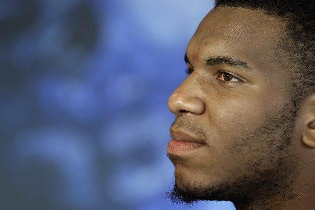 North Carolina tight end Eric Ebron takes questions from reporters during the team's NCAA college football media day activities in Chapel Hill, N.C., Saturday, Aug. 3, 2013. (AP Photo/Gerry Broome)