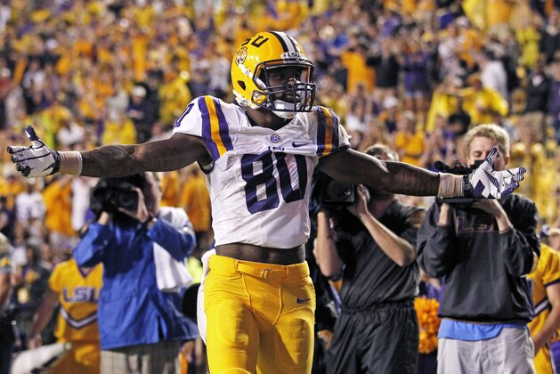 LSU wide receiver Jarvis Landry (80) celebrates his touchdown reception in the second half of an NCAA college football game against Auburn in Baton Rouge, La., Saturday, Sept. 21, 2013. LSU won 35-21. (AP Photo/Gerald Herbert)