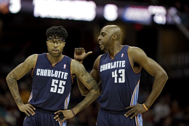 Charlotte Bobcats' Anthony Tolliver (43) talks to Chris Douglas-Roberts (55) in an NBA basketball game against the Cleveland Cavaliers Saturday, April 5, 2014, in Cleveland. (AP Photo/Mark Duncan) Charlotte Bobcats' Anthony Tolliver (43) talks to Chris Douglas-Roberts (55) in an NBA basketball game against the Cleveland Cavaliers Saturday, April 5, 2014, in Cleveland. (AP Photo/Mark Duncan)