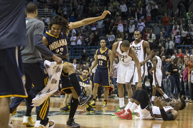 Indiana Pacers' Chris Copeland (22) reacts after sinking a game-winning shot against the Milwaukee Bucks during the second half of an NBA basketball game on Wednesday, April 9, 2014, in Milwaukee. The Pacers defeated the Bucks 104-102. (AP Photo/Tom Lynn)