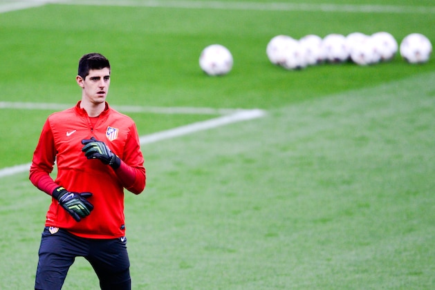Belgium's goalkeeper Thibaut Courtois gestures, after Belgium won 2-1 against Serbia, during their World Cup 2014 Group A qualifying soccer match at the King Baudouin stadium in Brussels, Friday, June 7, 2013. (AP Photo/Yves Logghe)