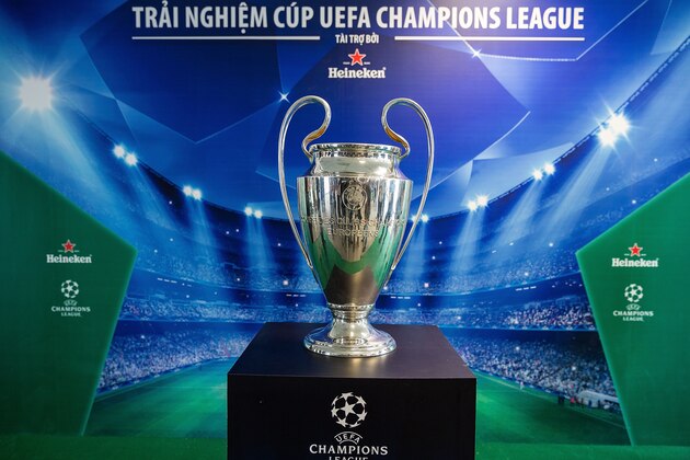 HO CHI MINH CITY, VIETNAM - APRIL 03:  The Heineken UEFA Champions League Trophy at the Bitexco Financial Tower on April 3, 2014 in Ho Chi Minh City, Vietnam. Football fans were given the opportunity to visit with the Heineken UEFA Champions League Trophy on a three-nation tour that stopped in Vietnam under the auspices of Champions League partner, Heineken. Fans took photographs with the brand ambassador, ex-international football star Ruud Van Nistelroy.  (Photo by Nicolas Axelrod/Getty Images)