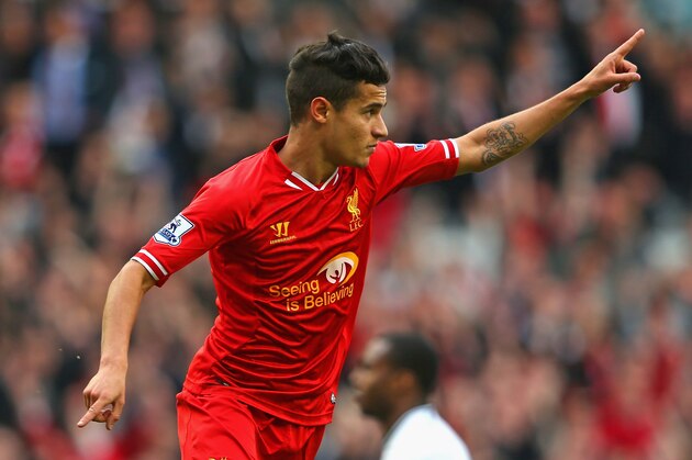 LIVERPOOL, ENGLAND - MARCH 30: Philippe Coutinho of Liverpool celebrates scoring the third goal during the Barclays Premier League match between Liverpool and Tottenham Hotspur at Anfield on March 30, 2014 in Liverpool, England. (Photo by Alex Livesey/Getty Images) LIVERPOOL, ENGLAND - MARCH 30: Philippe Coutinho of Liverpool celebrates scoring the third goal during the Barclays Premier League match between Liverpool and Tottenham Hotspur at Anfield on March 30, 2014 in Liverpool, England. (Photo by Alex Livesey/Getty Images)