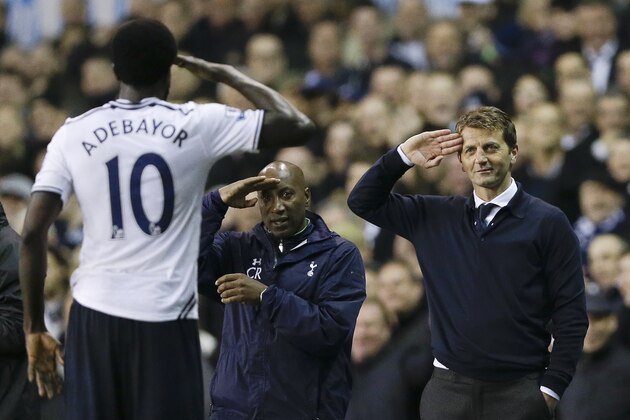 Tottenham's Emmanuel Adebayor, left, salutes to manager Tim Sherwood, right, after he scores a goal during the English Premier League soccer match between Tottenham Hotspur and Sunderland at White Hart Lane stadium in London, Monday, April 7, 2014. (AP Photo/Kirsty Wigglesworth) Tottenham's Emmanuel Adebayor, left, salutes to manager Tim Sherwood, right, after he scores a goal during the English Premier League soccer match between Tottenham Hotspur and Sunderland at White Hart Lane stadium in London, Monday, April 7, 2014. (AP Photo/Kirsty Wigglesworth)