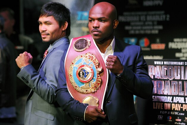 NEW YORK, NY - FEBRUARY 06: Manny Pacquiao (L) and Timothy Bradley stand for photos during the press conference to promote their upcoming WBO welterweight champtionship rematch at New World Stages on February 6, 2014 in New York City.  (Photo by Maddie Meyer/Getty Images)
