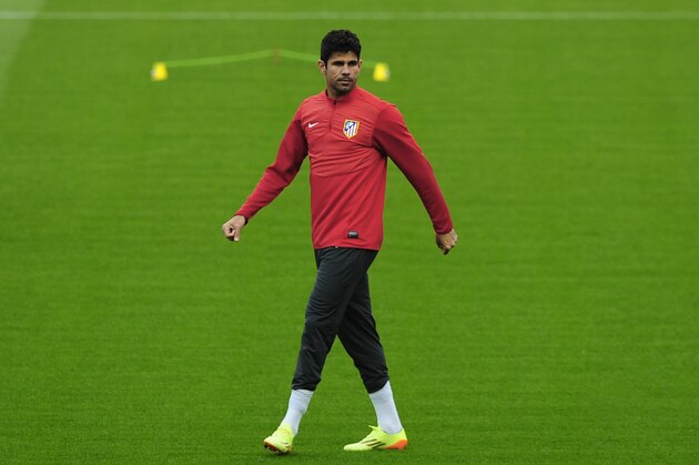 Atletico Madrid's Diego Costa, attends a training session at the Camp Nou stadium in Barcelona, Spain, Monday, March 31, 2014. FC Barcelona will face Atletico Madrid in a first leg quarter-final Champions League soccer match  April 1. (AP Photo/Manu Fernandez)